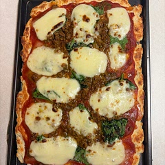 Cooked crust for 10, then with toppings for 5, and broil for 2ish (watch), spread crust thinner