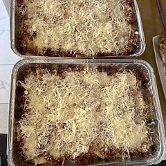 So far I’ve only prepped it for the freezer. I used two 9x13” lasagna pans. This time I just split the pasta, sauce, etc in half between each pan instead of layering as described in the recipe. I just did pasta, then provolone slices, then sauce/meat, then mozzarella and Parmesan cheese. I used extra cheese and it still may need more. For sure if I make again I’ll use more pasta and sauce/meat for the 9x13 pan size. We’ll see how it bakes.