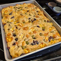 I can't believe how absolutely AMAZING this bread was! My fiance, who hates olives, ate a quarter of the loaf. We took the rest to my son's 16th birthday party and came home with crumbs. The process was simple and the bubbles were massive. This is definitely my new go-to focaccia recipe. 