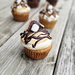 Delicious! My recipe modifications: filled the cupcakes with ganache and swapped reciped Swiss merengue frosting with a marshmallow frosting before tarnishing with more ganache and a mini s'more on top.