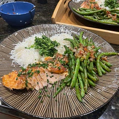 Delicious! We added chopped chives and cilantro on top of the salmon and fried shallots and chili on top of the green beans. Served with vermicelli rice noodles on the side. Also baked the salmon separately instead of cooking it in the skillet.