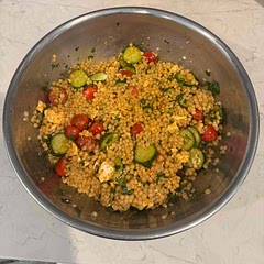 This dish was delicious and I will definitely make it again. Here are a few variations that I made to the original recipe which enhanced the taste based on my personal preferences: added a teaspoon of garlic powder, used mini cucumbers instead of a regular cucumber, substituted cilantro for mint, used yellow mustard instead of Dijon mustard, and I boiled the couscous in canned chicken broth instead of water to give it a more flavorful taste. I also cooked ground turkey (crumbled) with Greek seasoning (Cavender's is recommended but any will suffice) to add to the dish.