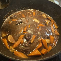 Used beef bouillon (2 cubes) and ended up thickening the gravy at the end. Delicious!