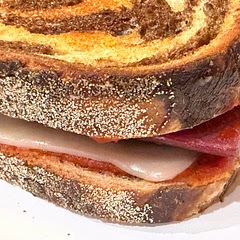 I used our venison salami - so yum! I wish I would have sliced it a bit thinner.  With the thicker pieces it needs a little longer on the skillet. Will make again!