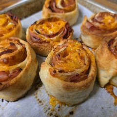 This was easy and delicious. I didn't realize I was out of mustard, so I didn't make it exactly as written. I also added precooked cooked bacon strips. 

Made a few with no cheese for my son who actually ate it without complaining. (What a blessing). 

Pulled my Pillsbury canned pizza dough as thin as I could and it made about 12 decent size rolls. 

