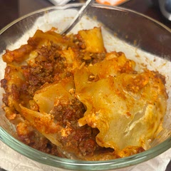 The only pic I got was the leftovers for my husband’s lunch lol. I used 1.75 lbs of beef and 1 lb of sausage because I prefer meat-heavy lasagnas (esp during that time of the month- that iron is needed fr lol). I wish I had used two tubs of cheese instead though. You could double this recipe and do just fine in a deep dish and using a whole box of lasagna noodles. It was good, but I also use a ton of italian Badia seasoning as well.