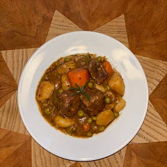 This was delicious! Very deep flavor and makes great leftovers. I utilized my oven so that I didn’t need to babysit the stew while it simmered. I brought to a simmer on the stove, then transferred to the oven to bake for 2 hours at 325 degrees. I also added 2 tsp of Italian herbs, a whole head of garlic, and an herb bundle of fresh thyme and rosemary to the pot. At the end of the bake time, I squeezed the garlic into the stew. Would be great served over mashed potatoes!