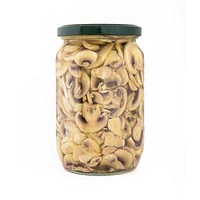 Sliced champignon in jar