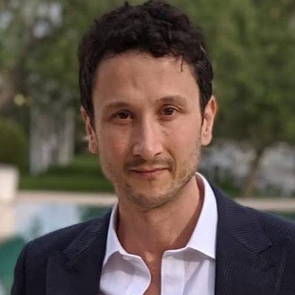 Gino M.
