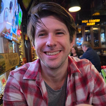 TUCKER WARNER