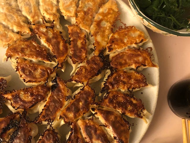 Wednesday's is usually a "what's the fastest thing I can make" kind of night - sometimes leftovers, sometimes frozen things, and some other under-15-min meals. This is a little bit of a cheating recipe, but I make batches of dumplings on a weekend and then freeze them. So for dinner I'll take them from the freezer, put them directly on a nonstick skillet with a little oil and a couple tablespoons of water, then cover and heat so they're crispy. I'll eat them with soy sauce (and chili crisp!). I'll usually also quickly steam some frozen broccoli or sautee some spinach to have something green with it. 