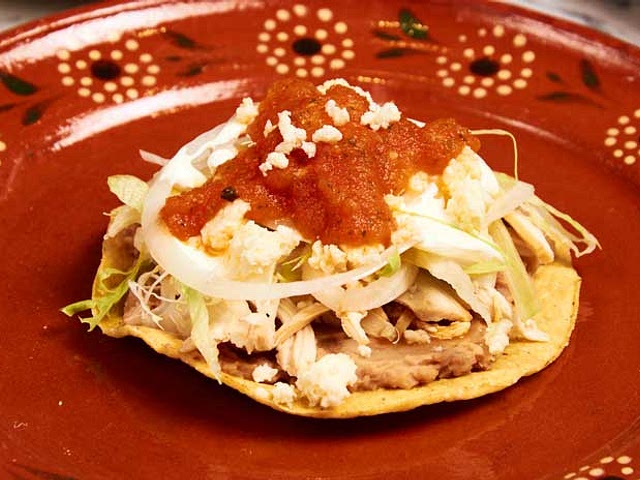 Anything on a tostada! If it's one of those weeks and I don't have time or am too tired, I'll pick up a rotisserie chicken and add to a tostada. Often with beans and salsa and cheese.