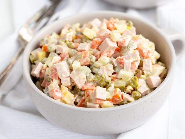 Olivier salad is always a good choice when I go to my friends and it's easy to make
