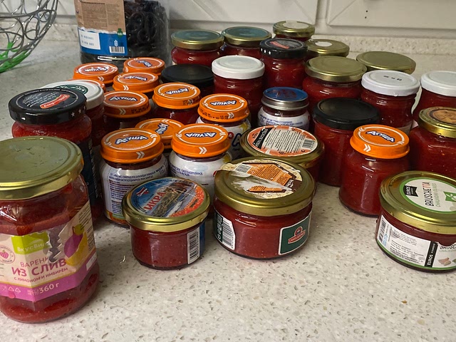 During summer we always just blend strawberries with sugar, put in the jars and freeze them. Then in winter take a jar out, put in the warm water to thaw and eat with pancakes :) Here's one of the recent batches 