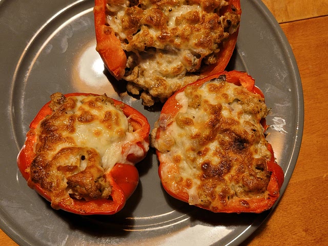 lean ground turkey with random spices, mushrooms, and onions and mozzarella cheese. sautéed the turkey with spices first. then stuffed pepper and baked at 375 for 15 min. finished with broiled for a min for a nice cheese crisp.