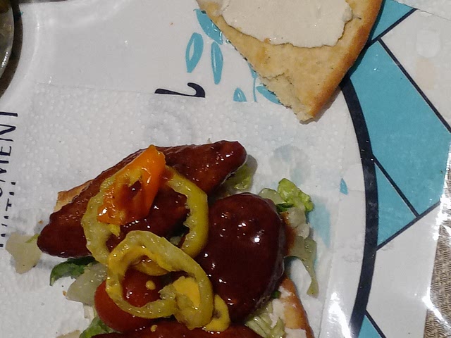 All non heated peppers & yes sweet & tangy banana peppers included, yellow onions, garlic, chao or daiya cheese, sky valley sweet chili, naan bread, great for everything but not to over do it, did I mention minced garlic😊Here's a naan tender sandwich😁