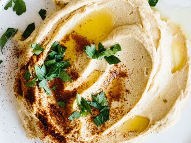 hummus and carrot sticks, bell pepper, cucumber and pita chips if you want a slight more filling snack.