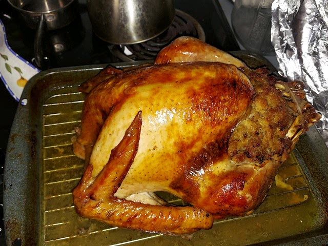 I also cooked my first turkey in my late 40's. It was way easier than I had built up in my head...really no different than roasting a chicken.  Here is a simple recipe. You don't need to put the stuffing in the turkey - you can make it separately. This is really a personal preference.

I also agree with Dana that making sure it is fully thawed out is the #1 criteria.