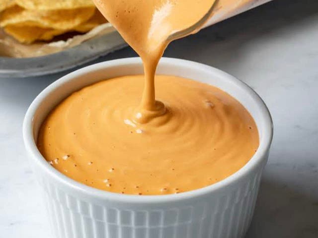 This cheese sauce is very versatile. Just add a thin layer and pile on things like black beans, tomatoes, seasoned tofu or tempeh, onion, cilantro, jalapeños, black olives, a little hot sauce or salsa and a bit of lime juice and you have an amazing pie!