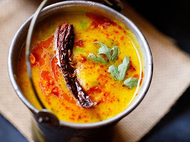 My favorite, Dal Tadka is lentil dish made with arhar dal (husked & split pigeon pea lentils) or masoor dal (husked & split red lentils) which is very delicious and healthy too. This Dal Tadka recipe gives you a delicious creamy dal with smoked flavors.