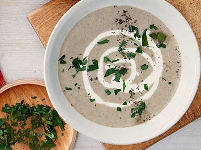 Homemade Soups and vegetable stews feel like the most straightforward option for your requirements. 

 However, I would say not all carbs are equally bad. Unprocessed carbs such as beans, oats, potatoes and rice will help keep you full in combination with protein and fats. It's all a balance.

Natural sugars are fine. I think avoiding "ADDED sugar" ( found in most processed foods) is more realistic and will have the biggest impact on your sugar craving.