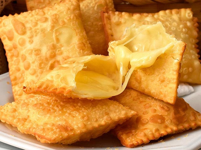 Brazilian 'pastel', and you can choose the filling of your liking (for inspiration: https://10pasteis.com.br/works/pasteis-tradicionais/)