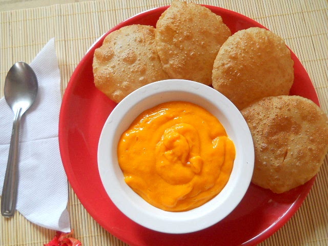 In India summer is the season of mangoes. This rich, juicy, pulpy fruit is my favourite and I love the dish called Aamras Puri, Aamras Puri is nothing but fresh Mango puree served with puris. Puris are made of wheat flour and deep fried in Oil. 😋😋😋😋