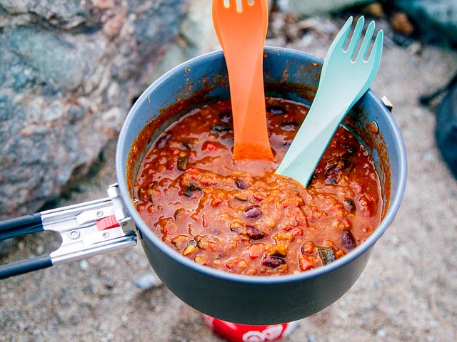 I think its always a good idea to make a chilli :) not sure how much cooking equipment you are taking with you, but a one pot meal seems like a best solution for hiking/rafting :) 