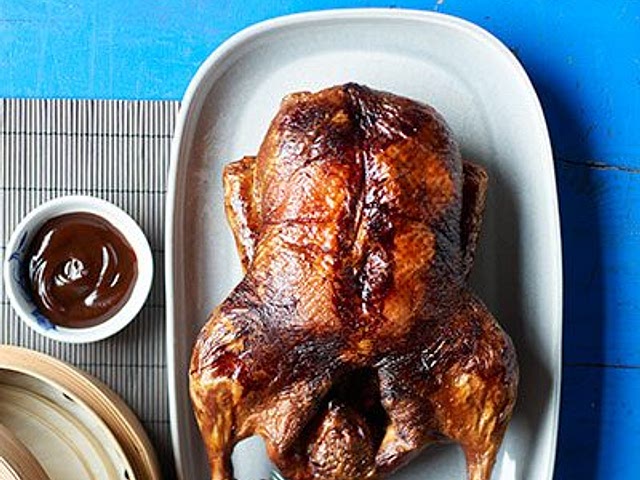 Anything that takes some extra effort/time, shows some love to me. It also depends on what foods he loves. Italian isn't romantic if you didn't bespokely choose it to his tastes. 

In my case, I would do scallops for a starter, then roasted Peking duck pancakes with hoisen sauce and a lemon tart for dessert.