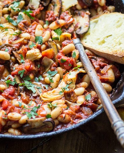 Tuscan White Bean Skillet with Tomatoes, Mushrooms, and Artichokes