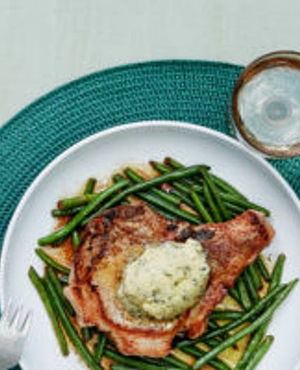 Pork chops with green beans and garlic butter
