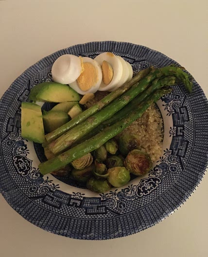 Quinoa bowl with asparagus and brussels sprouts