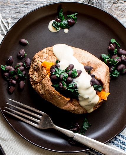 Stuffed Sweet Potato with Hummus Dressing