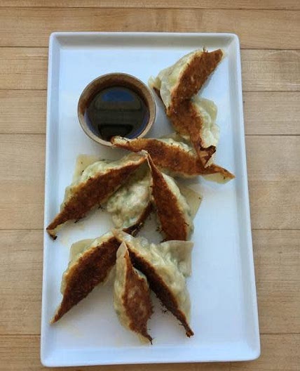 CHICKEN AND LEMONGRASS POTSTICKERS WITH PONZU DIPPING SAUCE