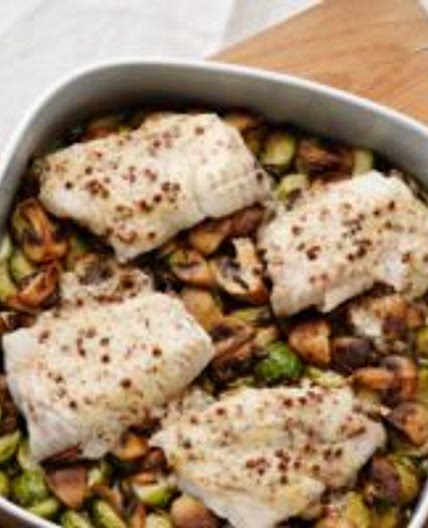 Butter-baked fish with Brussels sprouts and mushrooms
