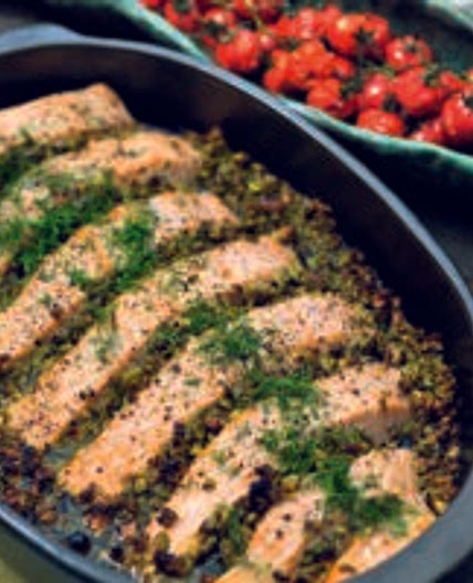 Salmon with olive-pistachio tapenade and tomatoes