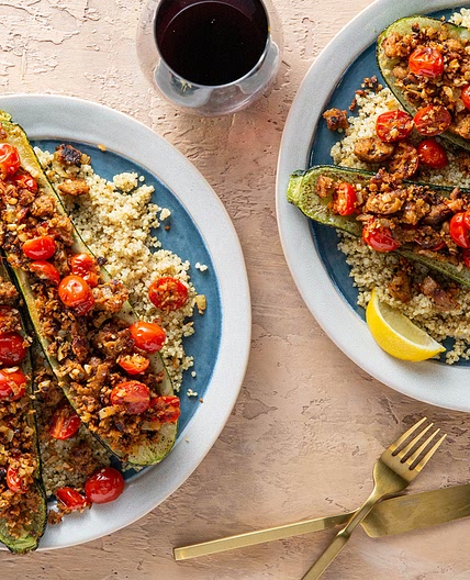 Tuscan Stuffed Zucchini with Herbed Sausage & Lemon Quinoa