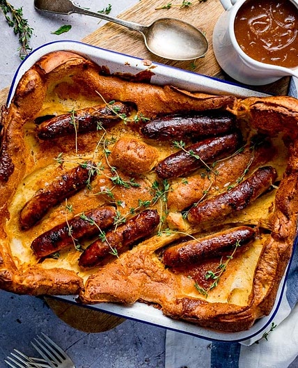 Toad in the hole with red onion gravy