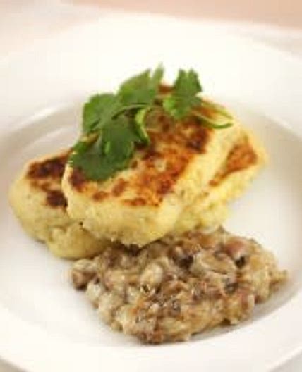 Kartofelniki with Meat in Mushroom Sauce