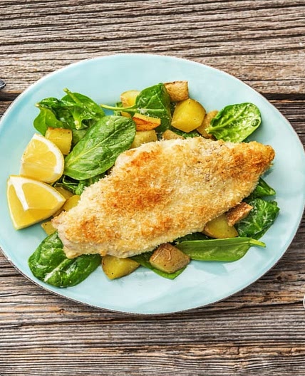 Panko Parm Poulet with Potatoes over Baby Spinach in a Creamy Lemon Dressing