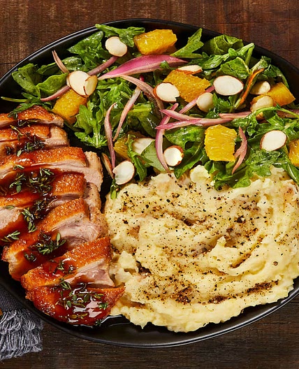 Duck a l’Orange with Duck Fat Mashed Potatoes & Arugula Almond Salad