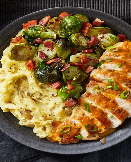 Butter-Basted Chicken Breasts with Candied Bacon Brussels Sprouts and Mashed Potatoes