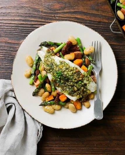 Balsamic roasted potatoes with asparagus, butter beans & seabass