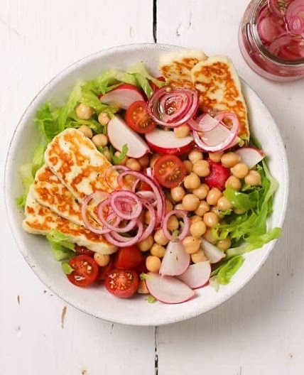 Grilled halloumi salad with board beans and pickled onions