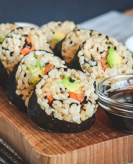 Plant-based sushi roll with avocado and carrot