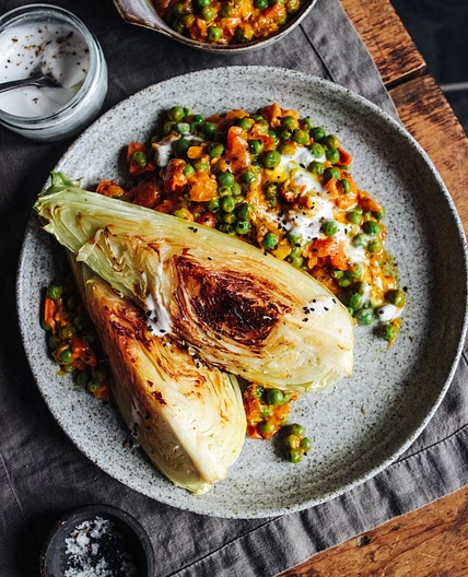 Charred Hispi Cabbage with Tomato, Pea and Coconut Curry