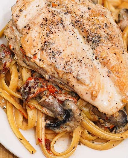 Chicken Breasts with Creamy Mushroom and Sun-Dried Tomato Pasta