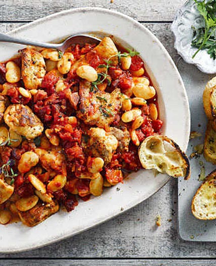 Griddled chicken thighs with chorizo and white bean stew