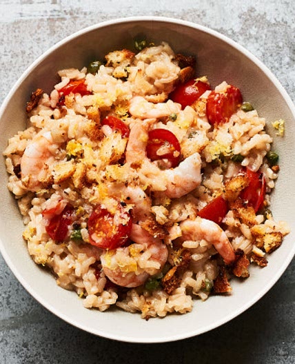 Anchovy, lemon and caper risotto with cherry tomatoes and prawns