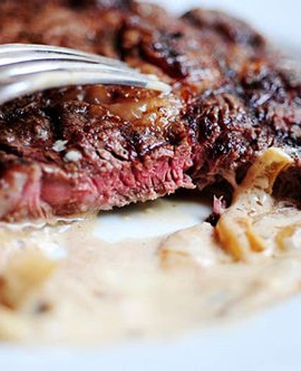 Grilled Ribeye Steak with Onion-Blue Cheese Sauce
